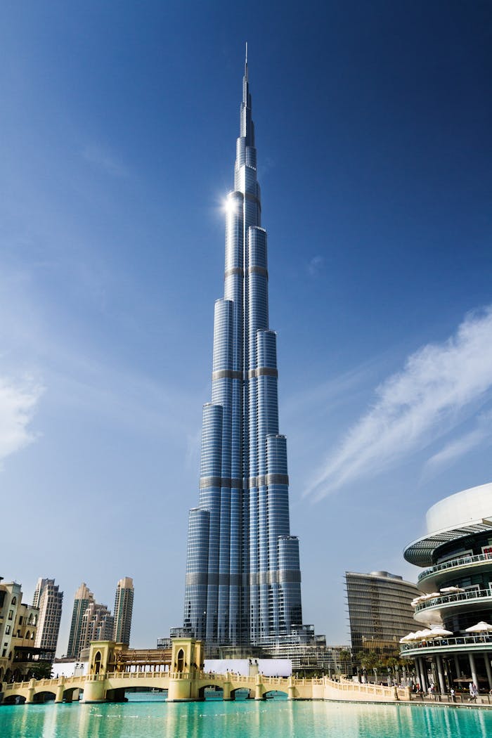 about-us Stunning daytime view of Burj Khalifa against a clear blue sky in Dubai.